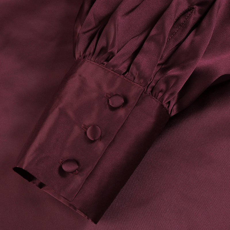 Elegante luchtige satijnen oversized top met wijde mouwen