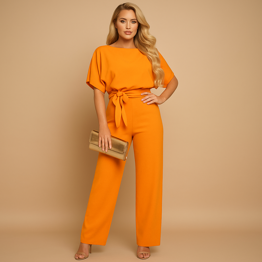 Glitter jumpsuit met halternek en open rug