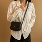 Compacte crossbodytas met tijdloos design