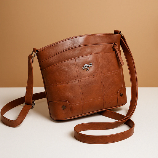 Compacte schoudertas met effen kleur en elegante afwerking