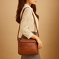 Compacte schoudertas met effen kleur en elegante afwerking
